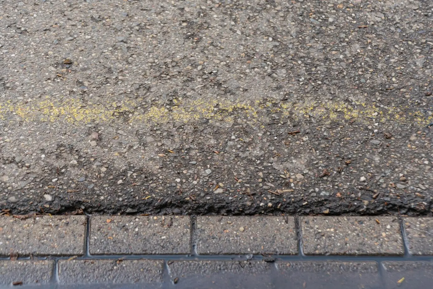 Grunge texture of an urban asphalt street.
